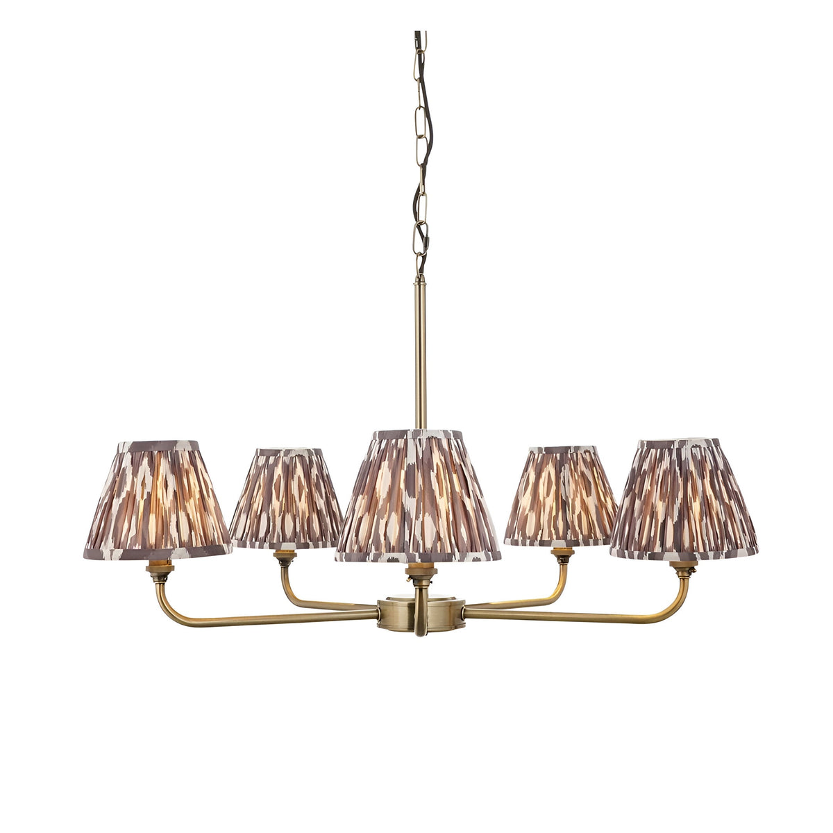 Caldmere 5 Light Ikat Pendant in Grey, five tapered pleated fabric shades on antique brass arms with chain suspension, shown on a plain white background.