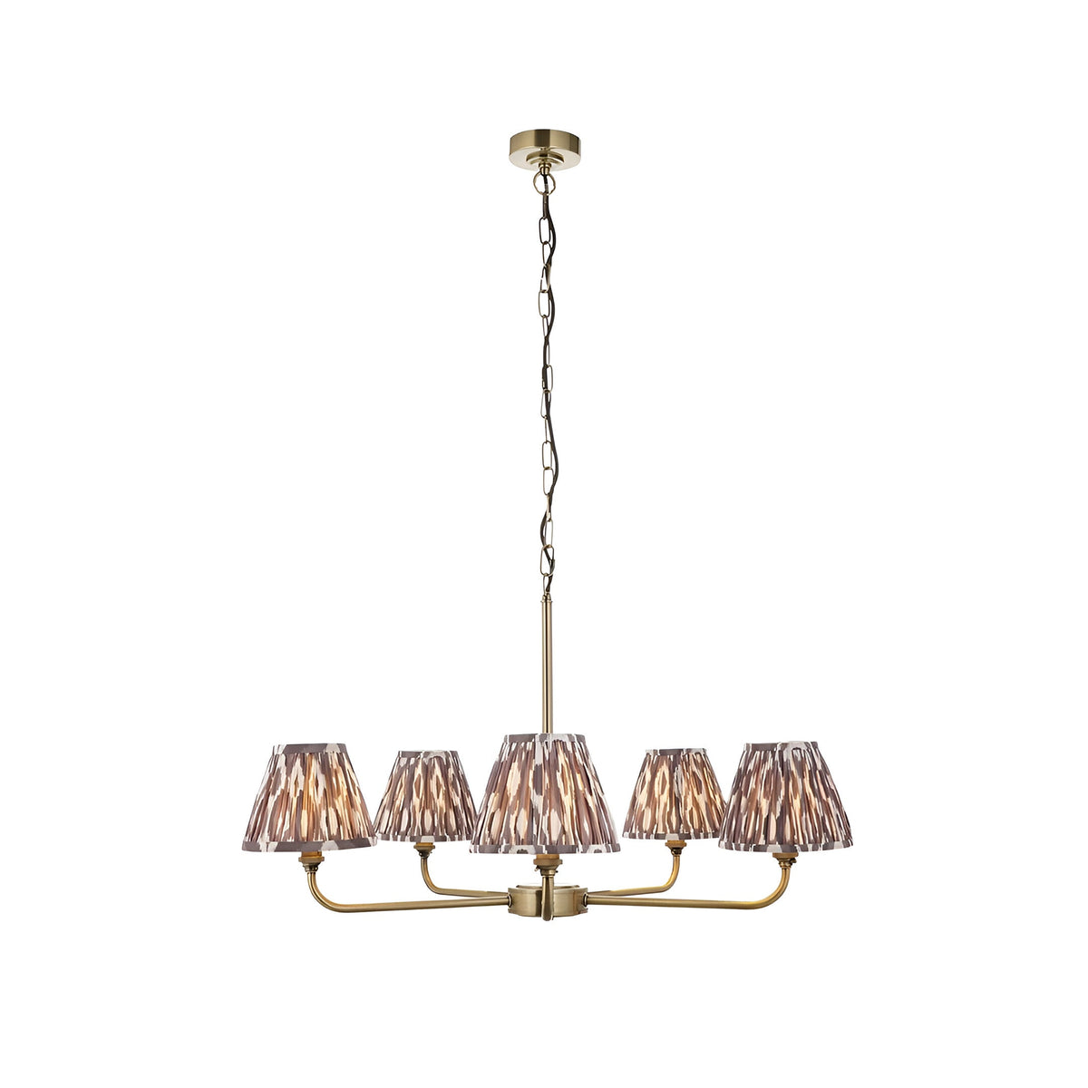 Caldmere 5-Light Ikat Pendant in Grey with tapered fabric shades on antique brass metalwork and chain suspension, shown on a white background.