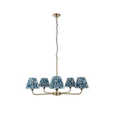 Endon Caldmere 5 light pendant with tapered pleated ikat shades in marlin blue on antique brass arms and chain, shown on a white background.