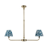 Endon Caldmere 2 light pendant with tapered pleated marlin blue ikat shades on an antique brass linear frame with telescopic stem, on white.