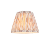 Endon Caldmere wall light shade in beige Ikat print, tapered pleated fabric design, shown illuminated against a plain white background.