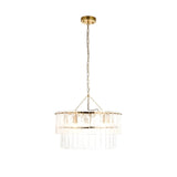 Endon Brockhurst 5 light chandelier with two tiers of textured glass panels and brushed aged brass frame on chain suspension, shown on white.