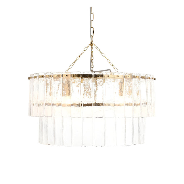 Endon Brockhurst 5 light chandelier with two tiers of textured glass panels on a brushed aged brass frame, suspended from a chain on a white background.