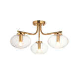 Pemberton 3 Light Semi-Flush Ceiling Light in brass, with three curved arms and clear seeded glass shades on a round ceiling plate, shown on a white background.