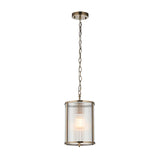 Endon Rothbury small pendant light with a cylindrical ribbed clear glass shade and antique brass frame, suspended from a chain on a plain background.