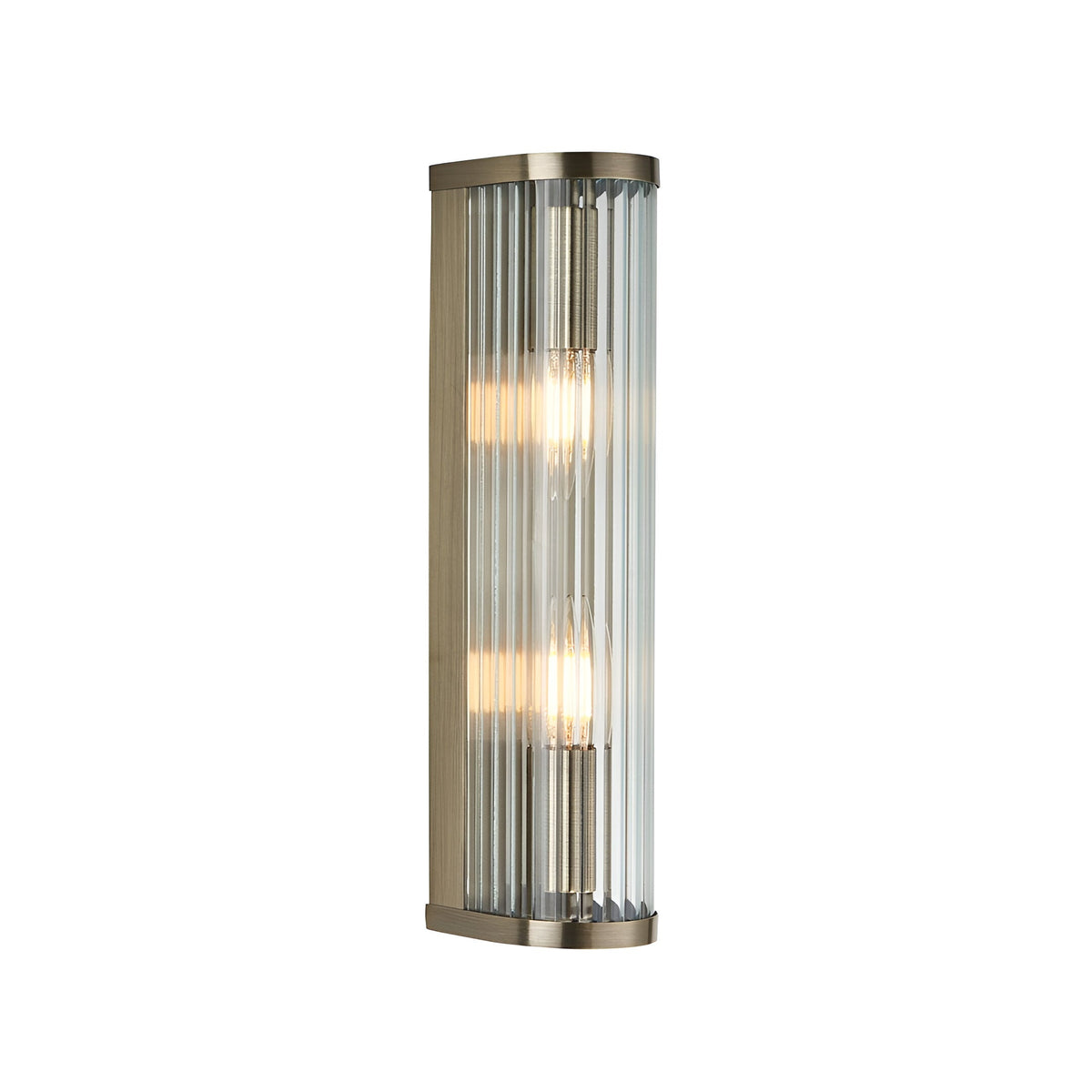 Rothbury 2 Light Wall Light in antique brass with vertically ribbed clear glass diffusers, shown lit against a plain white background.