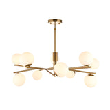 Grantham 10 Light Pendant in brushed brass metal, with matt opal glass globes on angled arms around a central stem, shown on a plain white background.