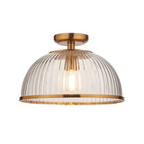 Langton Flush Downlight in brass, a single-light dome ceiling fixture with ribbed glass shade and E27 bulb, shown on a plain white background.