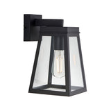 Caldwick Wall Light in matt black, a lantern-style fixture with clear glass panels and an angled bracket, shown against a plain white background.