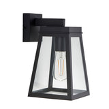Caldwick Wall Light in matt black with a lantern-style frame, clear glass panels, and visible E27 bulb, shown on a plain white background.