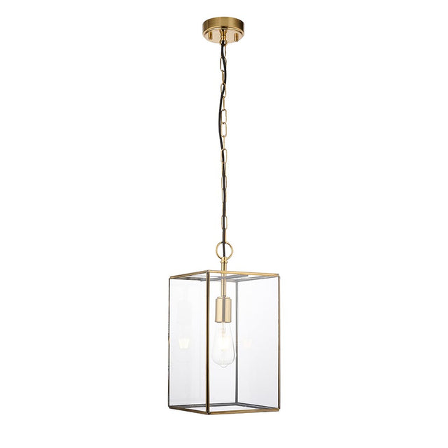Endon Haddon Grand Pendant in brushed aged brass, a square lantern single-light fitting with clear glass panels and exposed E27 bulb on chain suspension.