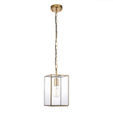 Haddon Pendant in brushed brass with a square lantern frame, clear glass panels, and exposed E27 bulb, suspended from a brass chain on a white background.