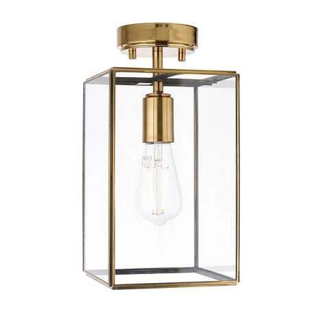 Endon Haddon flush ceiling light in aged brass with a rectangular clear glass shade and single E27 bulb, shown on a plain white background.