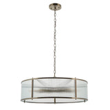 Endon Rothbury 8 light pendant in antique brass with a large drum frame of clear ribbed glass panels, suspended on a chain from a ceiling plate.
