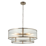 Endon Rothbury 8 light tiered chandelier in antique brass with clear ribbed glass panel shades over two tiers, suspended on a chain against a white background.