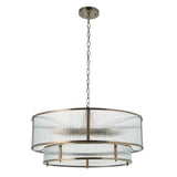 Endon Rothbury 8 light tiered chandelier in antique brass with clear ribbed glass panels over two tiers, suspended on a chain against a white background.