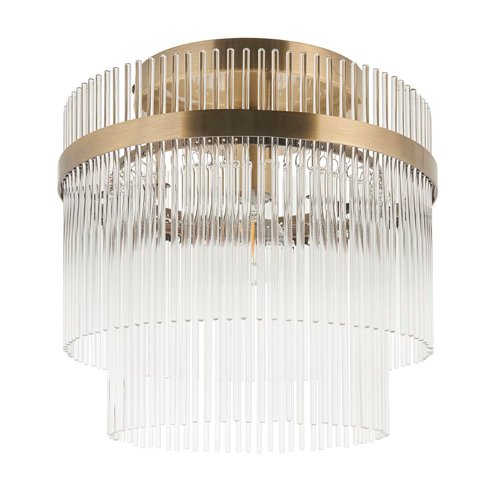 Endon Beaumont flush ceiling light in antique brass, with a two-tier arrangement of clear glass rods around a single E27 lamp, on a white background.