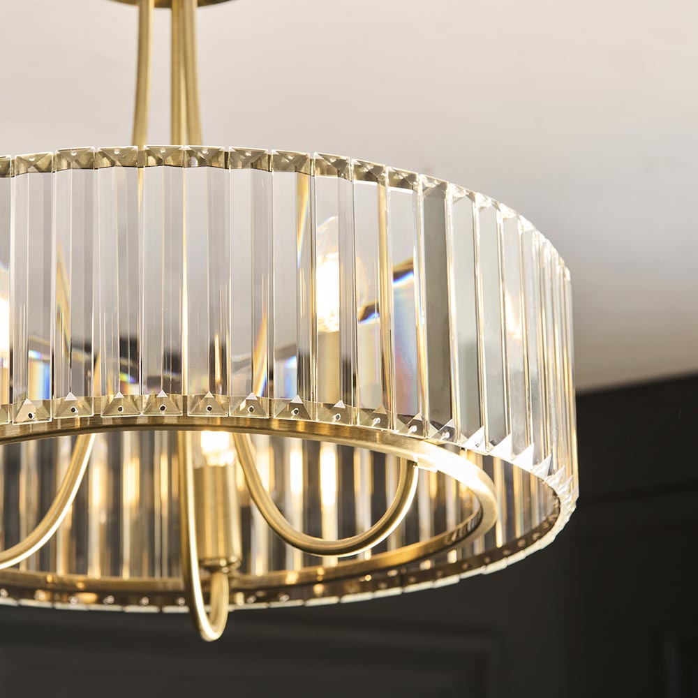 Fairfax 3 Light Semi-Flush Ceiling Light in antique brass, close-up of glass rod shade and brass frame with visible E14 bulbs.