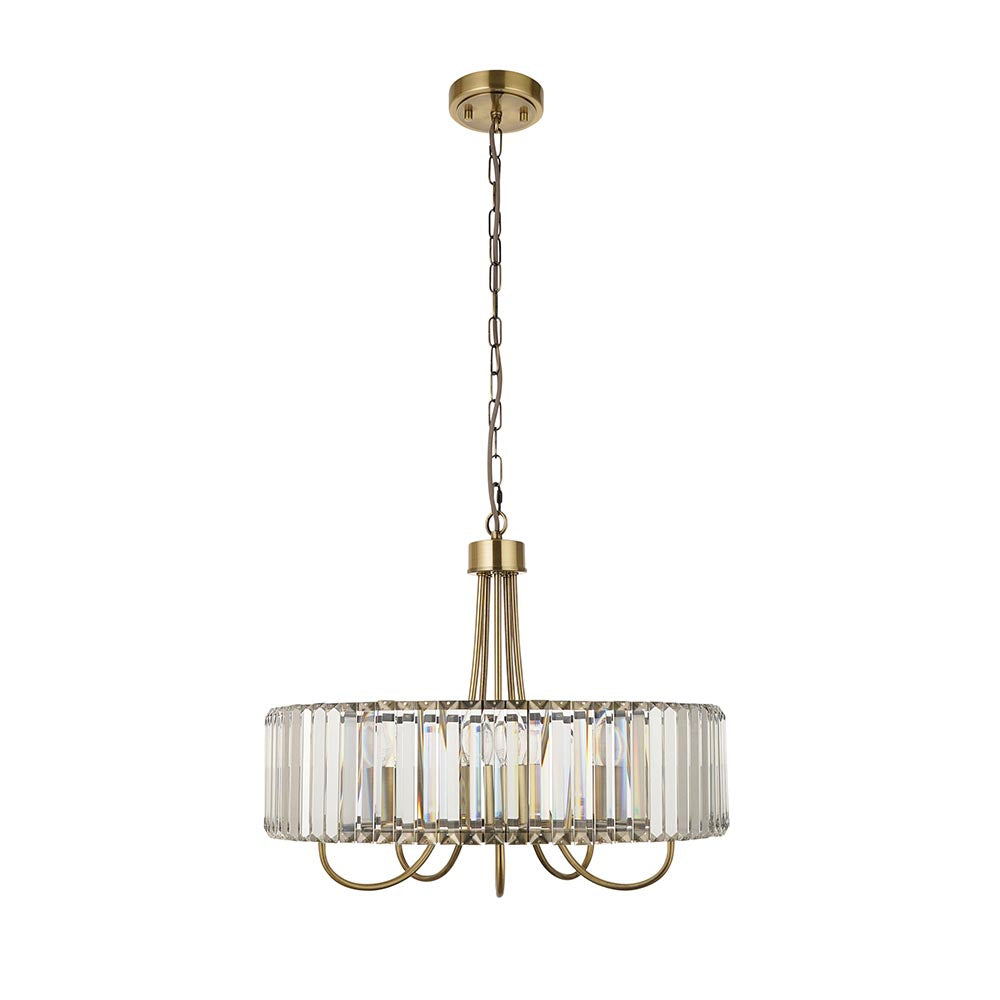 Fairfax 5 Light Pendant in antique brass with a drum-shaped ring of clear cut glass panels, hung from a long chain on a plain white background.