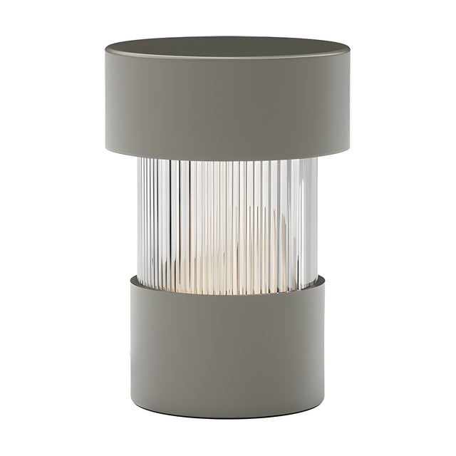 Balise LED Ribbed Glass Rechargeable Table Lamp in green, a cylindrical design with iron cap and base framing a fluted glass shade, shown on a plain white background.