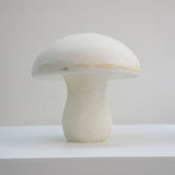 Morfia Mushroom Alabaster Table Lamp in Soft White, solid carved stone dome and stem in one continuous form, shown against a plain light background.