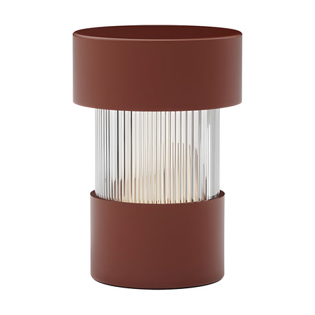Balise LED rechargeable table lamp with ribbed glass cylinder between terracotta iron top and base, cordless lantern design on a plain white background.