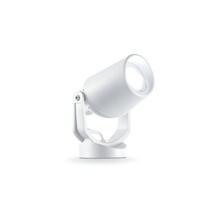 The Otis-2 Outdoor Single Spotlight in white showcases a sleek cylindrical design with a sturdy base. Made from high-performance resin, this spotlight is angled slightly upward, indicating adjustability with its directional diffuser for precise lighting.