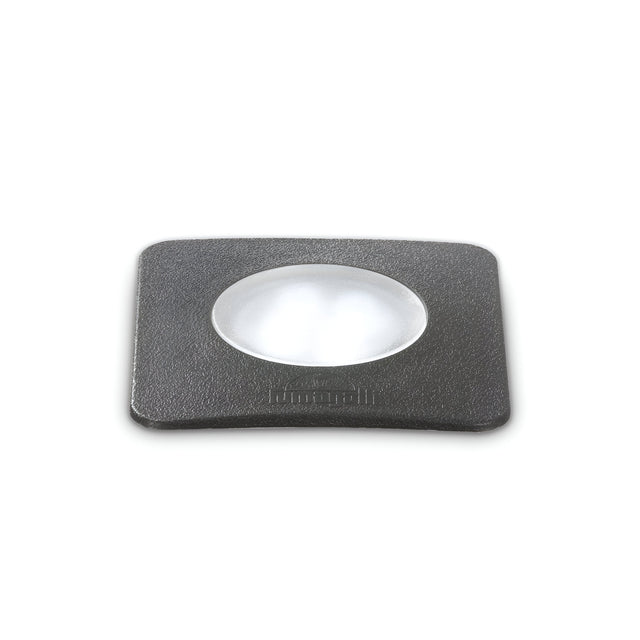 A square grey outdoor recessed ground light, made from durable brass, is placed on a white background.