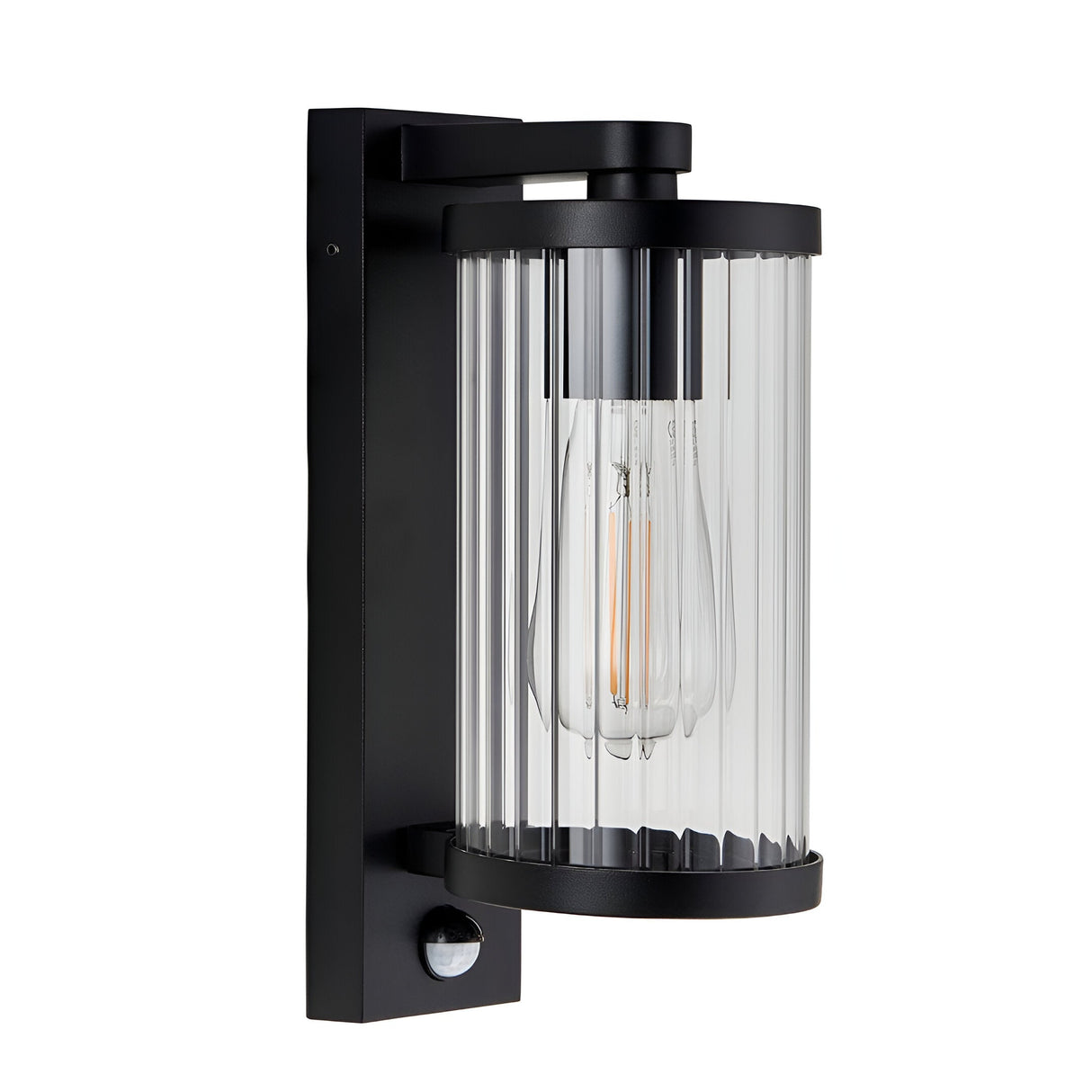 Endon Castbury outdoor wall light in matt black with a cylindrical clear ribbed glass shade, E27 filament bulb and integrated PIR sensor below.