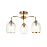 Halstead 3 Light Semi-Flush Ceiling Light in aged brass with three curved arms holding clear glass shades, shown on a plain white background.