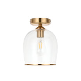 Halstead Flush Ceiling Light in aged brass with clear glass bell shade and exposed E27 bulb, shown on a plain white background.