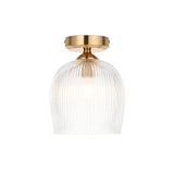 Endon Halstead flush ceiling light with a single ribbed glass dome shade and aged brass fitting, shown on a plain white background.