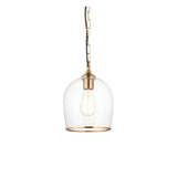 Halstead Pendant in brass with a clear glass dome shade, exposed bulb, and black chain suspension on a plain white background.