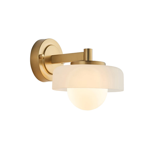 Endon Ashby brass wall light with a frosted glass shade encircling a matt opal glass sphere on a brushed aged brass arm, shown on a white background.