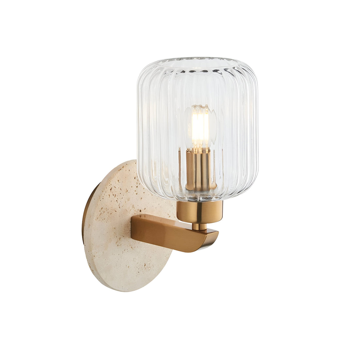 Cranton Wall Light in Brass & Natural, featuring a round travertine backplate, brass arm, and ribbed clear glass shade with visible bulb, on a white background.