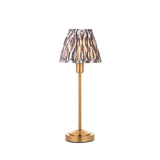 Cliffbourne Ikat Table Lamp with a stepped brass metal base and pleated, tapered grey Ikat-print fabric shade, shown on a plain white background.