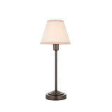 Endon Cliffbourne Ivy table lamp with slim antique bronze stepped base and tapered vintage white cotton shade with taped edge, on a white background.