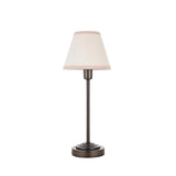 Endon Cliffbourne Ivy table lamp with a slim antique bronze stepped base and tapered vintage white cotton shade with almond taped edge, on white.