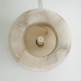 Top-down view of the Morfia Small Mushroom Alabaster Table Lamp showing the natural stone dome, hollow interior, and LED bulb fitting inside.