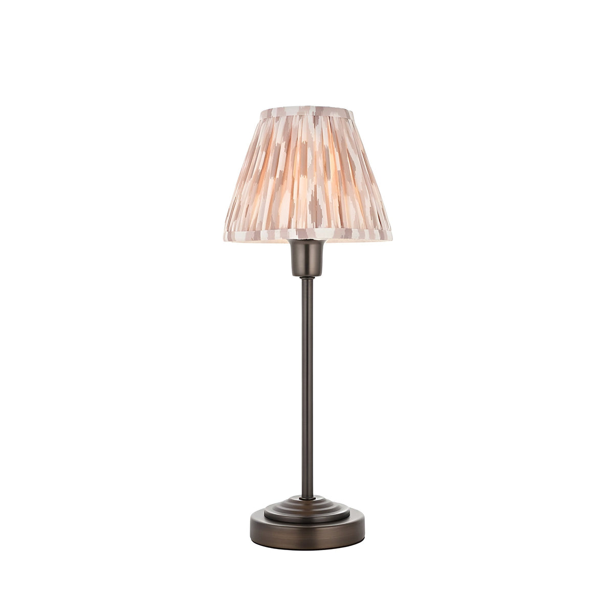 Cliffbourne Ikat Table Lamp in bronze with a slender stepped metal base and pleated, tapered striped ikat fabric shade, shown on a white background.