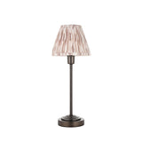 Bronze Cliffbourne Ikat Table Lamp with slim metal stem, stepped round base, and pleated tapered shade in soft ikat print.