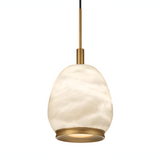 The Aurevia LED Drop Alabaster Single Pendant Light features a rounded, marble-patterned white glass shade, brushed brass accents, and a sleek black suspension cord for an elegant touch.