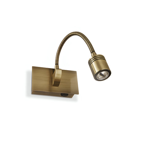 The Otis LED Wall Light 3W 4000K in Antique Brass showcases a flexible gooseneck design for adjustable lighting. It features an antique brass finish with a rectangular base and cylindrical head, all set against a white background.