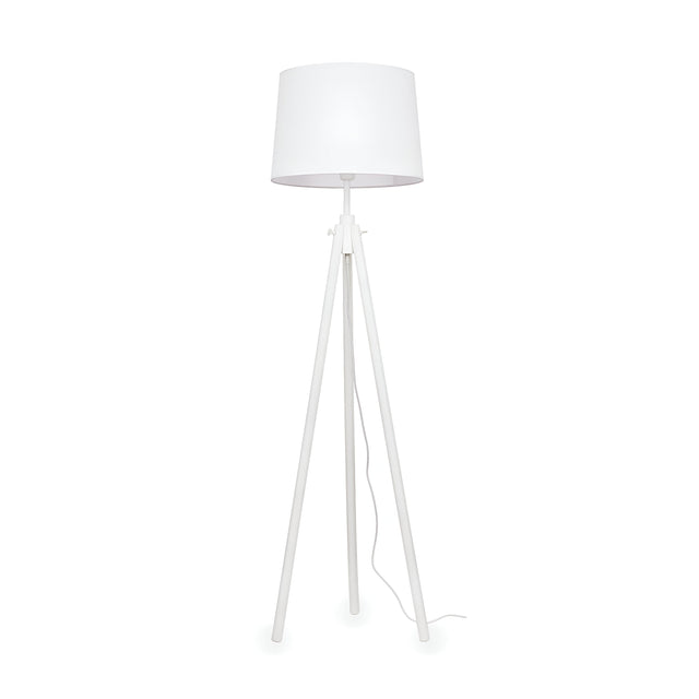 The Blues Wood Floor Lamp - White features a cylindrical shade on a tripod base, exemplifying minimalist lighting design. Its power cord extends visibly from the center, and this wooden floor lamp integrates effortlessly into modern interiors, making it ideal for contemporary spaces.