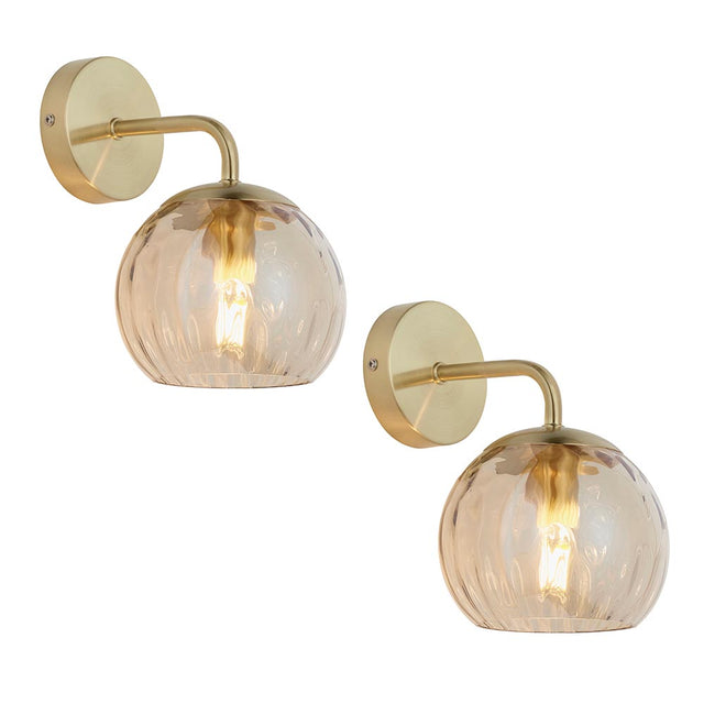 Endon Draycott twin pack wall lights with champagne dimpled glass globe shades on satin brass arms and round back plates, shown on a white background.