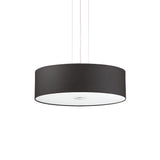 The Noble 4 Light Pendant - Black is a sophisticated circular light fixture that suspends gracefully from the ceiling. It features a sleek black finish and a smooth white diffuser on the bottom, enhancing its modern design.