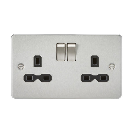 A 13A two-gang double pole switched socket with twin earths, featuring a brushed chrome finish and black insert on a sleek flat plate design, offering two three-pin outlets.