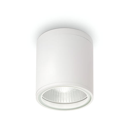 The Solar Downlight - White is a sleek, cylindrical ceiling light fixture with a recessed bulb, designed for surface installation. It's ideal for bathroom lighting and showcases a modern design with a smooth finish and a clear lens cover, adding elegance to any indoor or outdoor space.