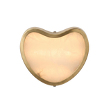 Niori Marea LED alabaster wall light with a heart-shaped brushed brass frame around a warm-lit natural alabaster face, shown on a white background.