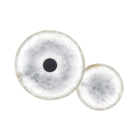 The Solmira LED Dual Disc Alabaster Wall Light in soft white and brushed brass features two overlapping, round alabaster disks creating sculptural wall lighting; the larger disk showcases a dark center accent.